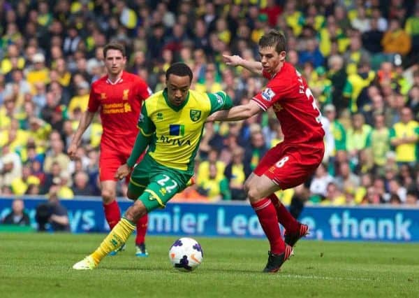 NORWICH, ENGLAND - Sunday, April 20, 2014: Liverpool's Jon Flanagan in action against Norwich City's Nathan Redmond during the Premiership match at Carrow Road. (Pic by David Rawcliffe/Propaganda)