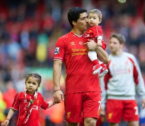 LIVERPOOL, ENGLAND - Sunday, May 11, 2014: Liverpool's Luis Suarez with his daughter Delfina and son Benjamin after the Premiership match against Newcastle United at Anfield. (Pic by David Rawcliffe/Propaganda)