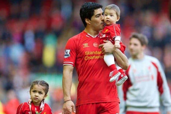 LIVERPOOL, ENGLAND - Sunday, May 11, 2014: Liverpool's Luis Suarez with his daughter Delfina and son Benjamin after the Premiership match against Newcastle United at Anfield. (Pic by David Rawcliffe/Propaganda)