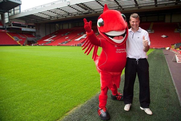 LIVERPOOL, ENGLAND - Saturday, June 21, 2014: Barry Cowan with Liverpool FC mascot Mighty Red on a visit to Anfield during Day Three of the Liverpool Hope University International Tennis Tournament. (Pic by David Rawcliffe/Propaganda)