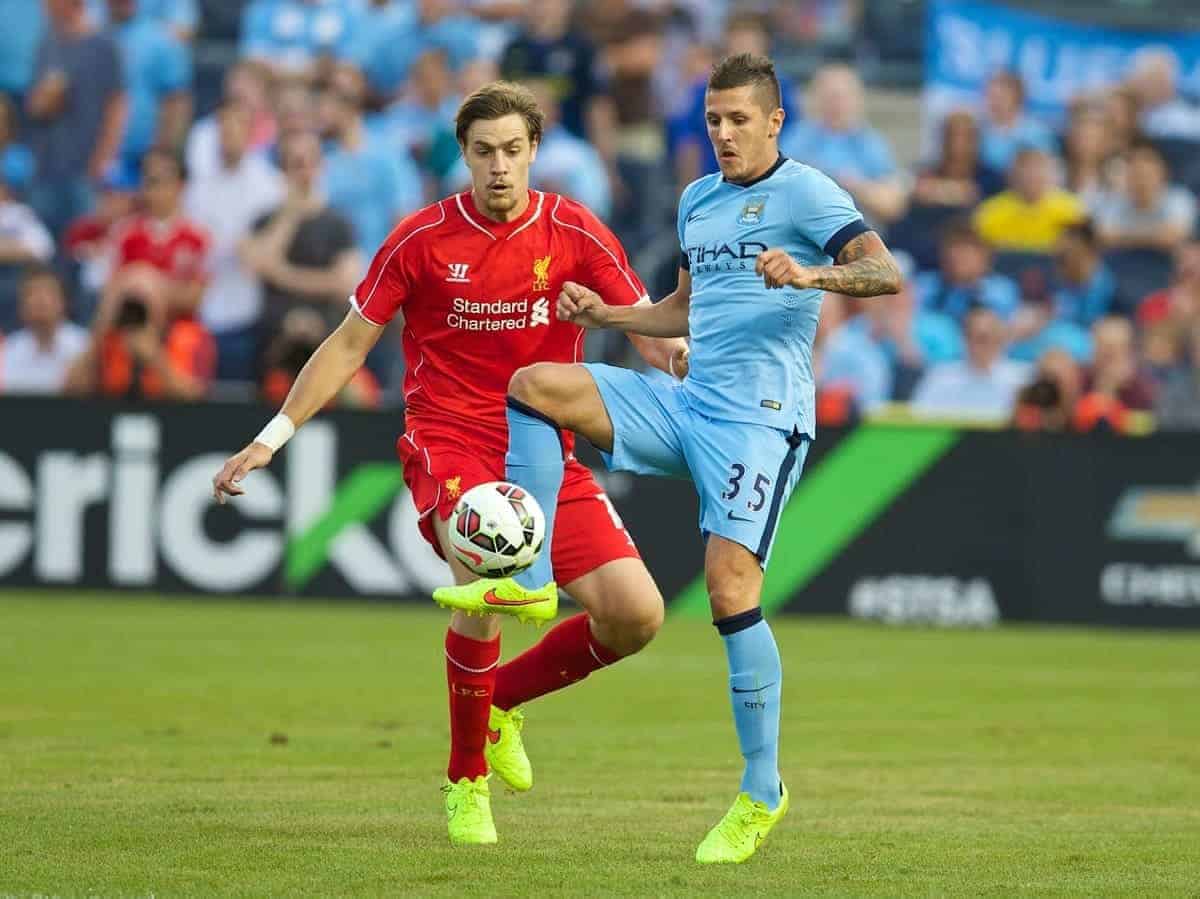 NEW YORK, USA - Wednesday, July 30, 2014: Liverpool's Sebastian Coates in action against Manchester City's Stevan Jovetic during the International Champions Cup Group B match at the Yankee Stadium on day ten of the club's USA Tour. (Pic by David Rawcliffe/Propaganda)