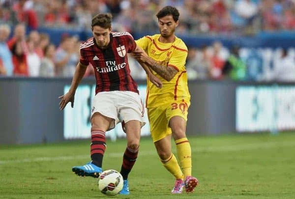 CHARLOTTE, USA - Saturday, August 2, 2014: Liverpool's 'Suso' Jesus Joaquin Fernandez Saenz De La Torre in action against AC Milan's Mattia De Sciglio during the International Champions Cup Group B match at the Bank of America Stadium on day thirteen of the club's USA Tour. (Pic by David Rawcliffe/Propaganda)