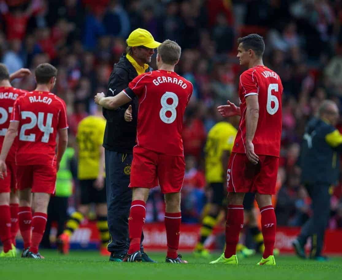 LIVERPOOL, ENGLAND - Sunday, August 10, 2014: Liverpool's captain Steven Gerrard and Borussia Dortmund's head coach Jurgen Klopp during a preseason friendly match at Anfield. (Pic by David Rawcliffe/Propaganda)