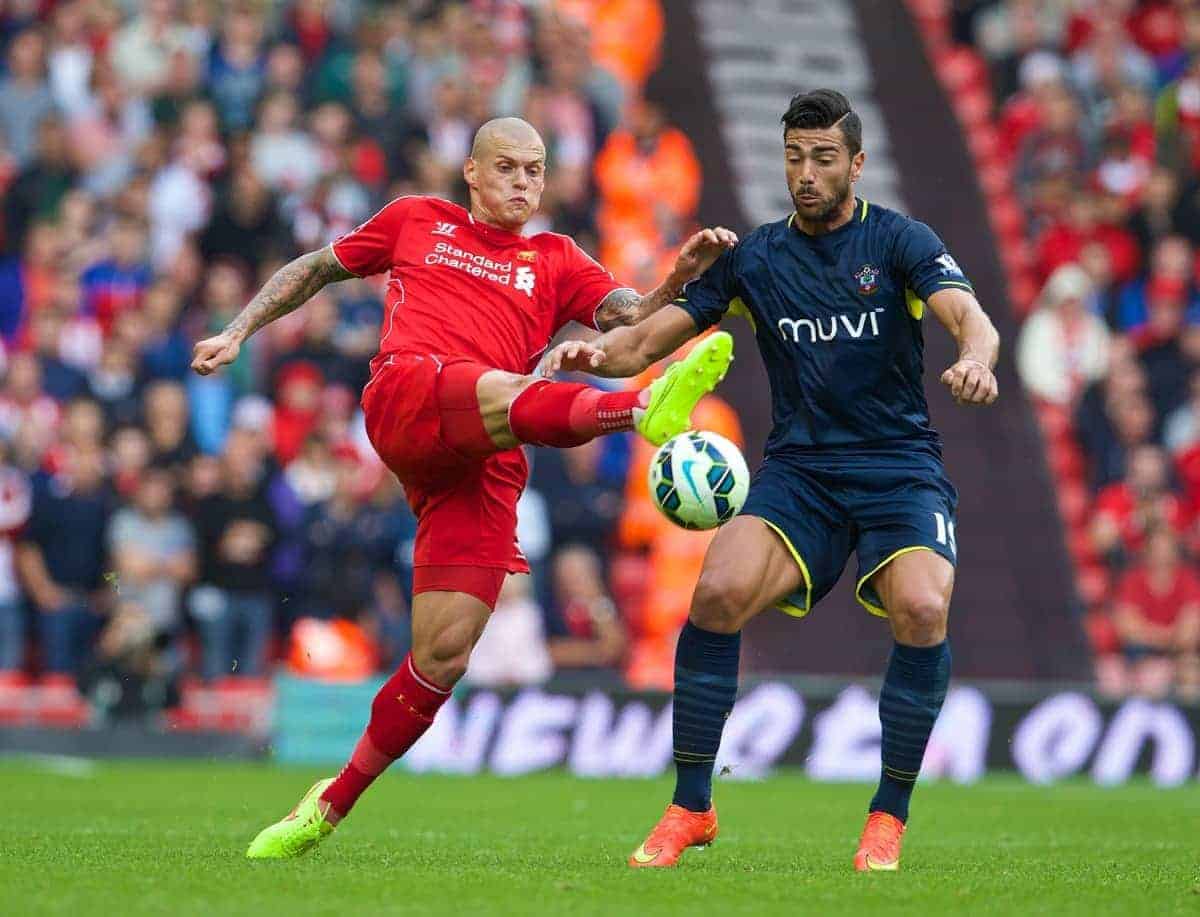 LIVERPOOL, ENGLAND - Sunday, August 17, 2014: Liverpool's Martin Skrtel in action against Southampton's Graziano Pelle during the Premier League match at Anfield. (Pic by David Rawcliffe/Propaganda)