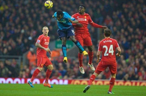 LIVERPOOL, ENGLAND - Saturday, November 29, 2014: Liverpool's Kolo Toure in action against Stoke City's Mame Diram Diouf during the Premier League match at Anfield. (Pic by David Rawcliffe/Propaganda)