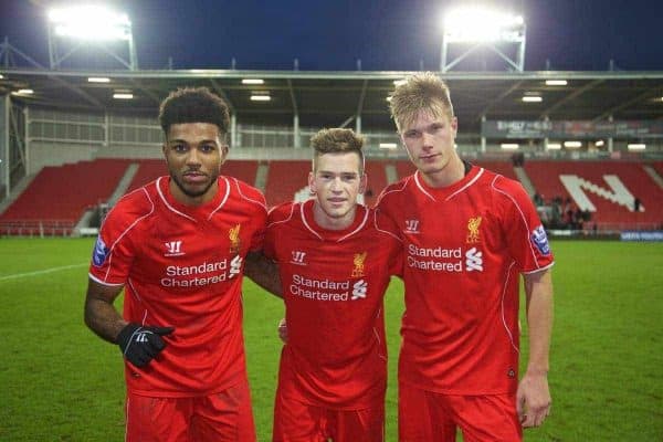 LIVERPOOL, ENGLAND - Tuesday, December 9, 2014: Liverpool's goalscorers Jerome Sinclair, Ryan Kent and Daniel Cleary celebrate making it to the final found of the UEFA Youth League after a 2-0 Group B victory over FC Basel at Langtree Park. (Pic by David Rawcliffe/Propaganda)