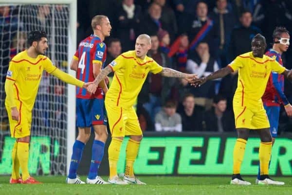 LONDON, ENGLAND - Saturday, February 14, 2015: Liverpool's Emre Can, Martin Skrtel and Mamadou Sakho hold hands against Crystal Palace during the FA Cup 5th Round match at Selhurst Park. (Pic by David Rawcliffe/Propaganda)