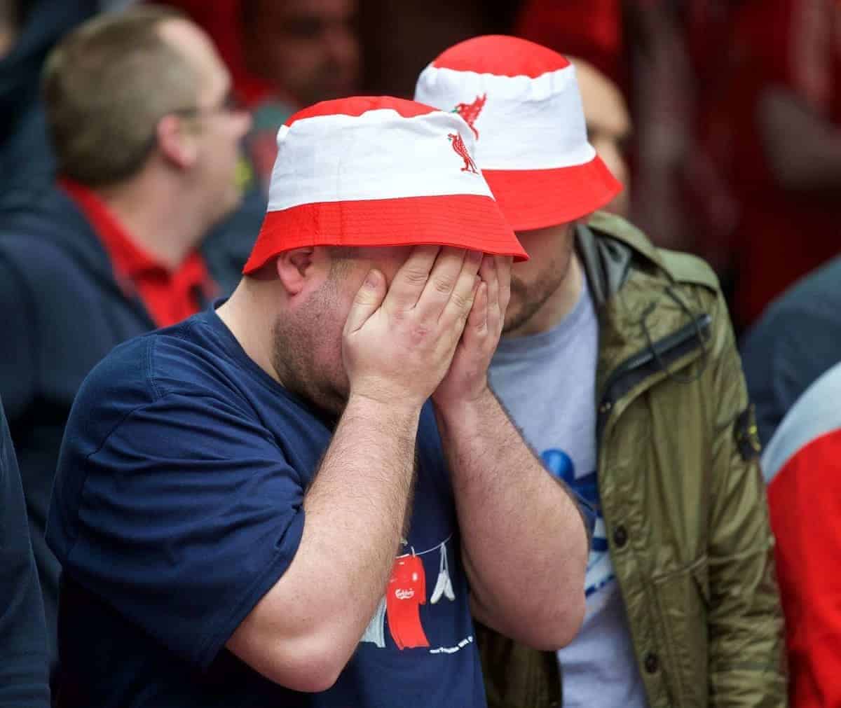 LONDON, ENGLAND - Sunday, April 19, 2015: A Liverpool supporter looks dejected during the FA Cup Semi-Final match against Aston Villa at Wembley Stadium. (Pic by David Rawcliffe/Propaganda)