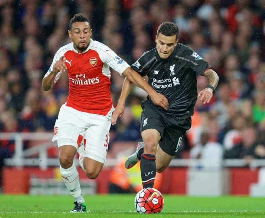 LONDON, ENGLAND - Monday, August 24, 2015: Liverpool's Roberto Firmino in action against Arsenal's Kieran Gibbs during the Premier League match at the Emirates Stadium. (Pic by David Rawcliffe/Propaganda)