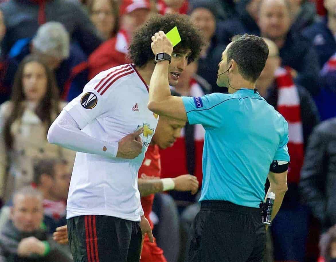 LIVERPOOL, ENGLAND - Thursday, March 10, 2016: Manchester United's Marouane Fellaini is shown a yellow card by referee Carlos Velasco Carballo during the UEFA Europa League Round of 16 1st Leg match at Anfield. (Pic by David Rawcliffe/Propaganda)