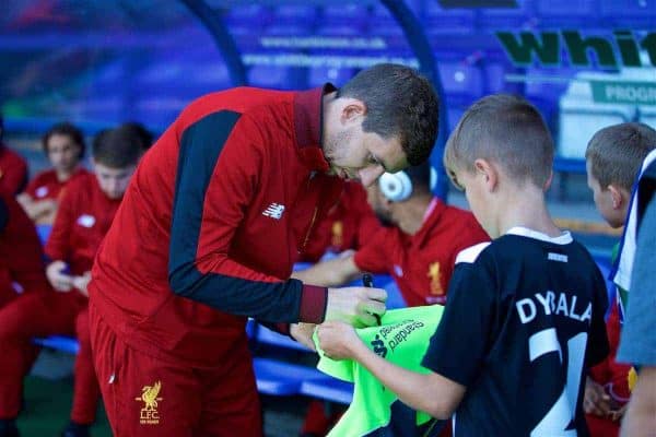 BIRKENHEAD, ENGLAND - Wednesday, July 12, 2017: Liverpool's Jon Flanagan signs an autograph for a supporter before a preseason friendly match against Tranmere Rovers at Prenton Park. (Pic by David Rawcliffe/Propaganda)