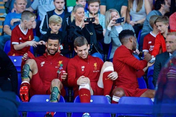 BIRKENHEAD, ENGLAND - Wednesday, July 12, 2017: Liverpool's substitutes Kevin Stewart, Jon Flanagan and Joe Gomez sit in the stands during a preseason friendly match against Tranmere Rovers at Prenton Park. (Pic by David Rawcliffe/Propaganda)