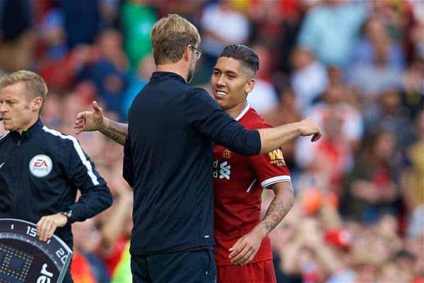 LIVERPOOL, ENGLAND - Sunday, August 27, 2017: Liverpool's manager Jürgen Klopp embraces Roberto Firmino after he substitutes him during the FA Premier League match between Liverpool and Arsenal at Anfield. (Pic by David Rawcliffe/Propaganda)