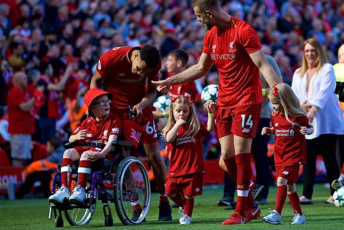 LIVERPOOL, ENGLAND - Sunday, May 13, 2018: Liverpool's Trent Alexander-Arnold pushes a wheelchair with young supporter Louis as the players perform a lap of honour after the FA Premier League match between Liverpool FC and Brighton & Hove Albion FC at Anfield. Liverpool won 4-0 and finished 4th. (Pic by David Rawcliffe/Propaganda)