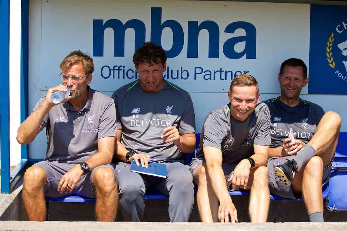 CHESTER, ENGLAND - Saturday, July 7, 2018: Liverpool's manager Jürgen Klopp, with backroom staff first team coach Peter Krawietz, first-team development coach Pepijn Lijnders, goalkeeping coach John Achterberg on the bench before a preseason friendly match between Chester FC and Liverpool FC at the Deva Stadium. (Pic by Paul Greenwood/Propaganda)