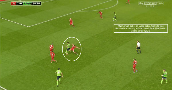 Much, much better as Lucas gets a foot in to stop Bertrand's run cutting in from the left flank. Responded well to earlier failure.