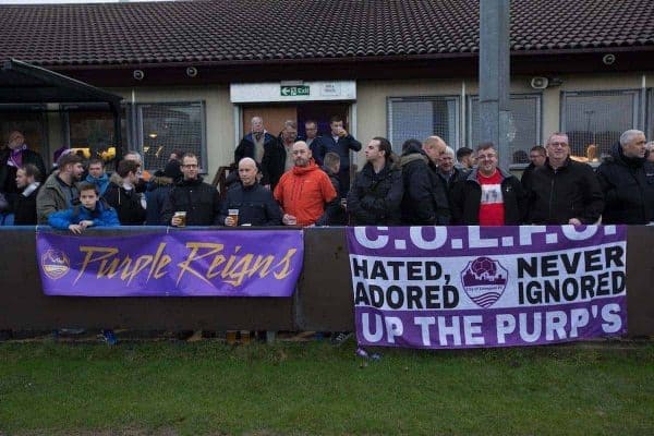 Spectators gather in front of the club house at the Delta Taxis Stadium, Bootle, Merseyside before City of Liverpool hosted Holker Old Boys in a North West Counties League division one match. Founded in 2015, and aiming to be the premier non-League club in Liverpool, City were admitted to the League at the start of the 2016-17 season and were using Bootle FC's ground for home matches. A 6-1 victory over their visitors took 'the Purps' to the top of the division, in a match watched by 483 spectators.