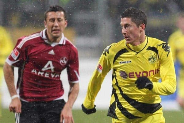 05.12.2010, EasyCredit Stadion, GER, Nuernberg, 1. FBL, 1. FC Nuernberg vs Borussia Dortmund, im Bild Robert Lewandowski ( Dortmund #07 ) ist vorbei an Dominic Maroh (FCN #6) und geht Richtung Tor EXPA Pictures © 2010, PhotoCredit: EXPA/ nph/ Becher ****** out ouf GER ******