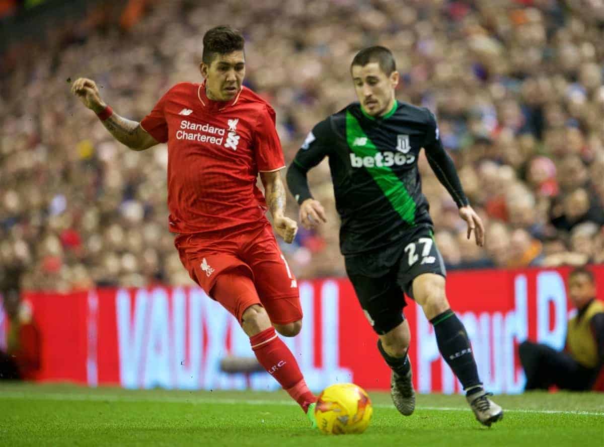 LIVERPOOL, ENGLAND - Monday, January 25, 2016: Liverpool's Roberto Firmino in action against Stoke City's Bojan Krkic during the Football League Cup Semi-Final 2nd Leg match at Anfield. (Pic by David Rawcliffe/Propaganda)