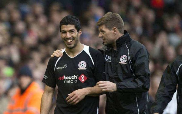 LIVERPOOL, ENGLAND - Sunday, March 29, 2015: Luis Suarez and Steven Gerrard share a joke at the end of the Liverpool All Star Charity match at Anfield. (Pic by Richard Martin-Roberts/Propaganda)