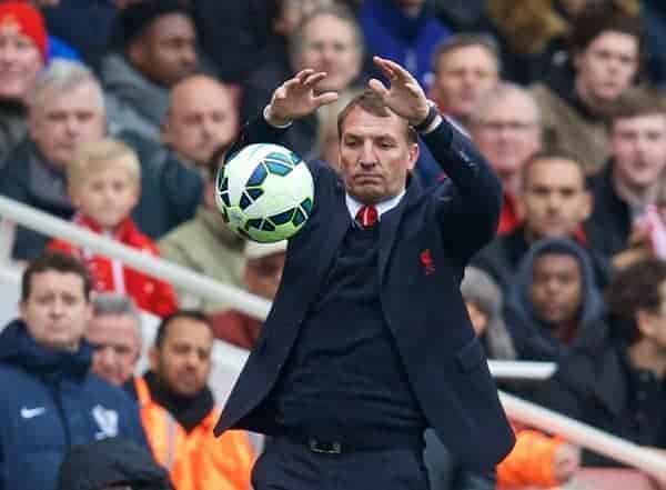 LONDON, ENGLAND - Saturday, April 4, 2015: Liverpool's manager Brendan Rodgers catches the ball the Premier League match against Arsenal at the Emirates Stadium. (Pic by David Rawcliffe/Propaganda)