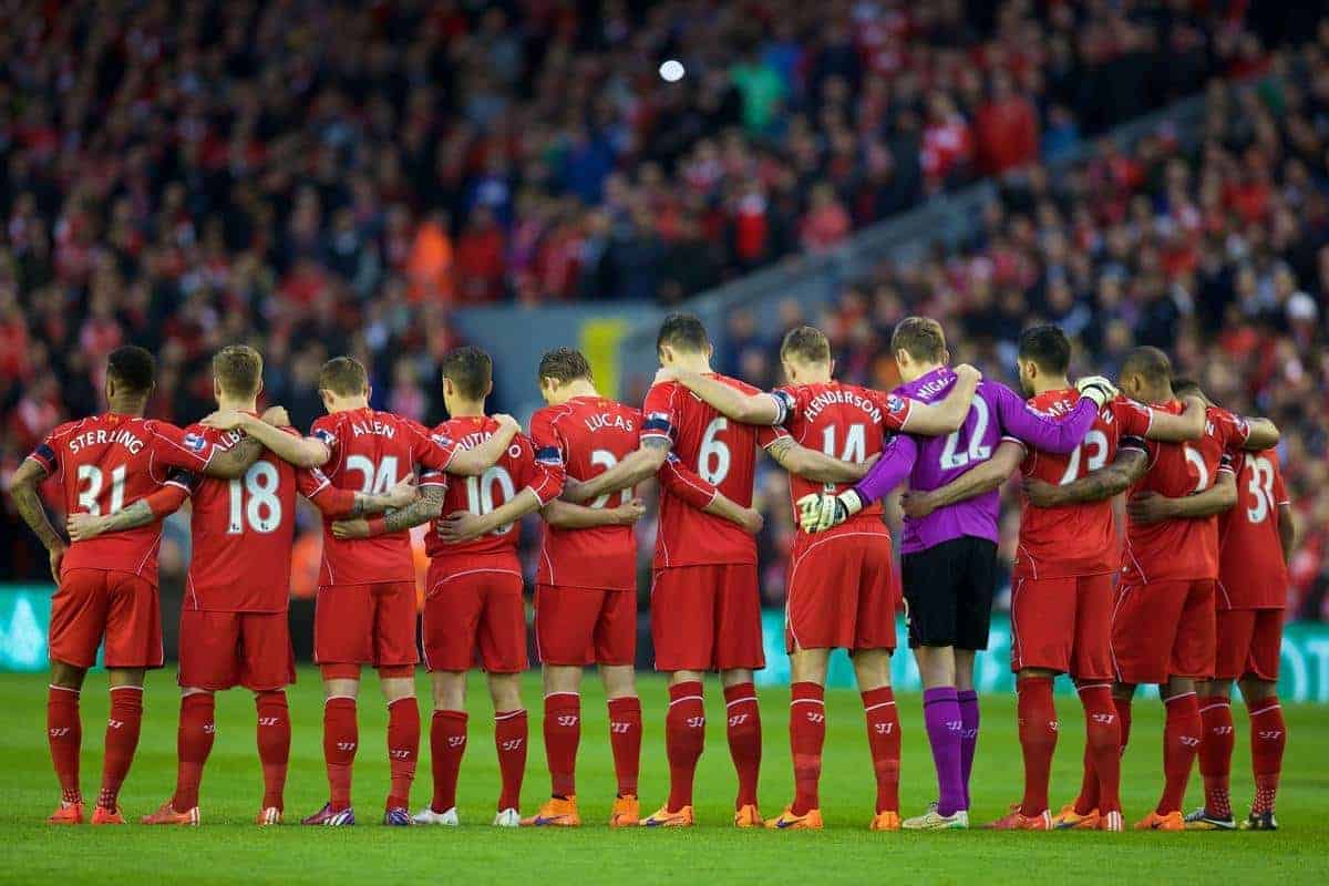 LIVERPOOL, ENGLAND - Monday, April 13, 2015: Liverpool players stand to remember the 96 victims of the Hillsborough Stadium Disaster before the Premier League match against Newcastle United at Anfield. (Pic by David Rawcliffe/Propaganda)