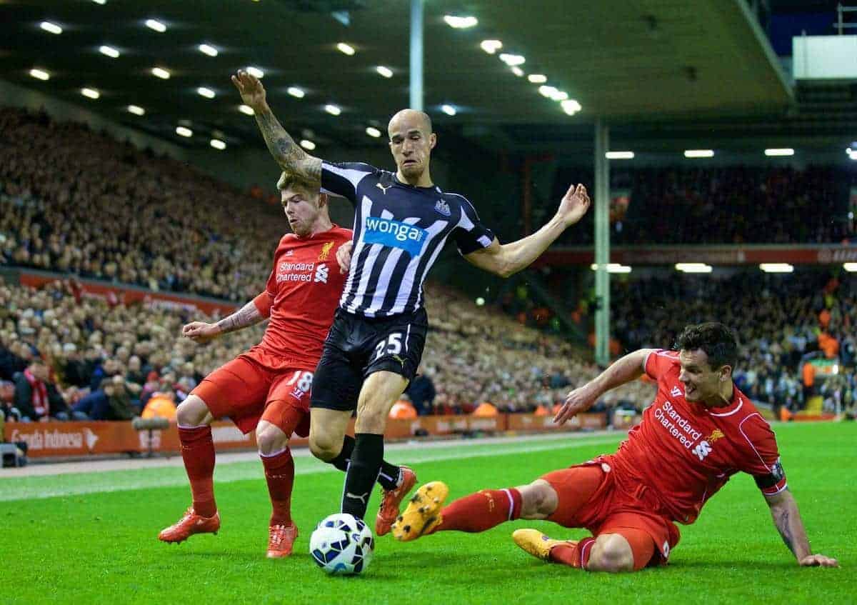 LIVERPOOL, ENGLAND - Monday, April 13, 2015: Newcastle United's Gabriel Obertan is tackled by Alberto Moreno and Dejan Lovren during the Premier League match at Anfield. (Pic by David Rawcliffe/Propaganda)