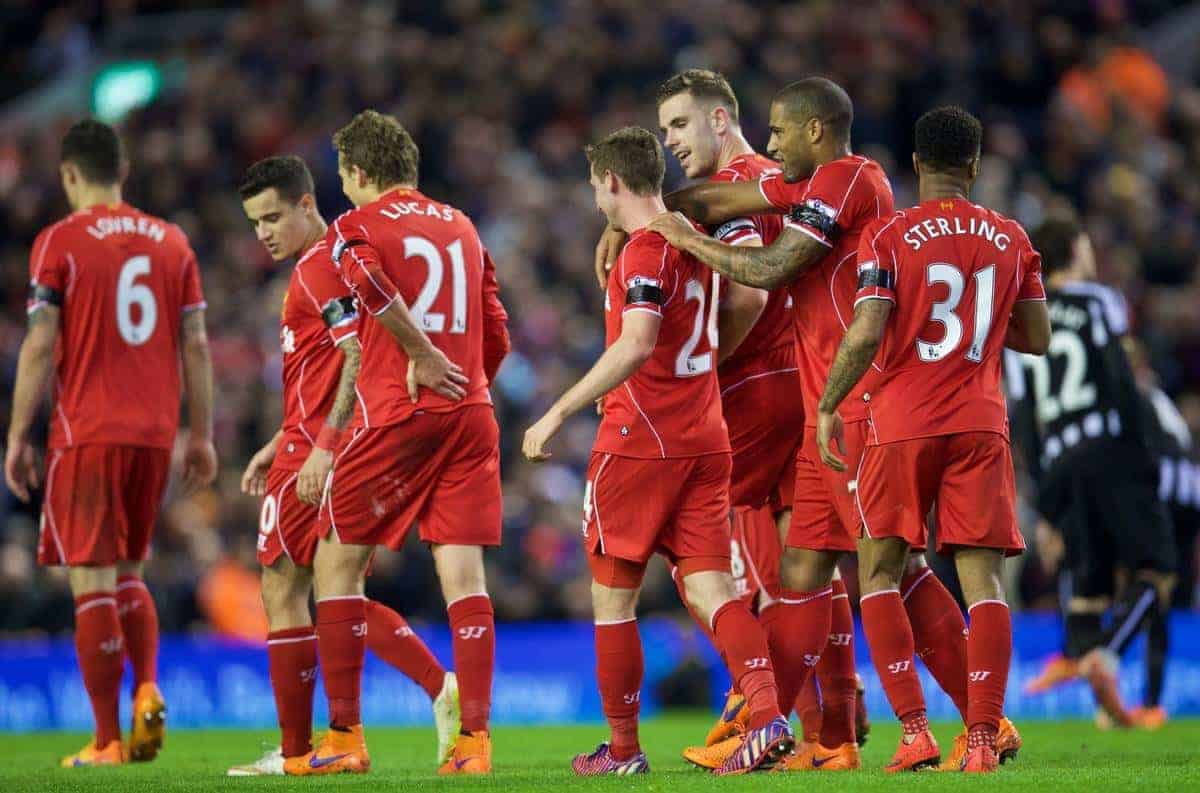 LIVERPOOL, ENGLAND - Monday, April 13, 2015: Liverpool's Joe Allen is mobbed by team-mates as he celebrates scores the second goal against Newcastle United during the Premier League match at Anfield. (Pic by David Rawcliffe/Propaganda)