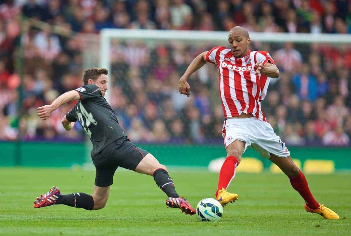 STOKE-ON-TRENT, ENGLAND - Sunday, May 24, 2015: Liverpool's Joe Allen in action against Stoke City's Steven N'Zonzi during the Premier League match at the Britannia Stadium. (Pic by David Rawcliffe/Propaganda)