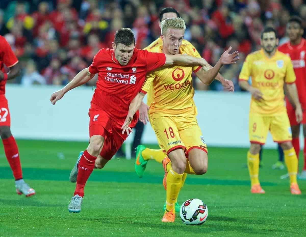 ADELAIDE, AUSTRALIA - Monday, July 20, 2015: Liverpool's James Milner in action against Adelaide United's James Jeggo during a preseason friendly match at the Adelaide Oval on day eight of the club's preseason tour. (Pic by David Rawcliffe/Propaganda)