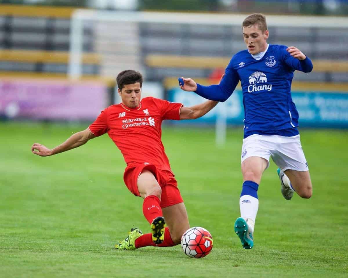 SOUTHPORT, ENGLAND - Wednesday, August 19, 2015: Liverpool's Joao Carlos Teixeira in action against Everton's Conor Grant during the Under 21 FA Premier League match at Haig Avenue. (Pic by David Rawcliffe/Propaganda)