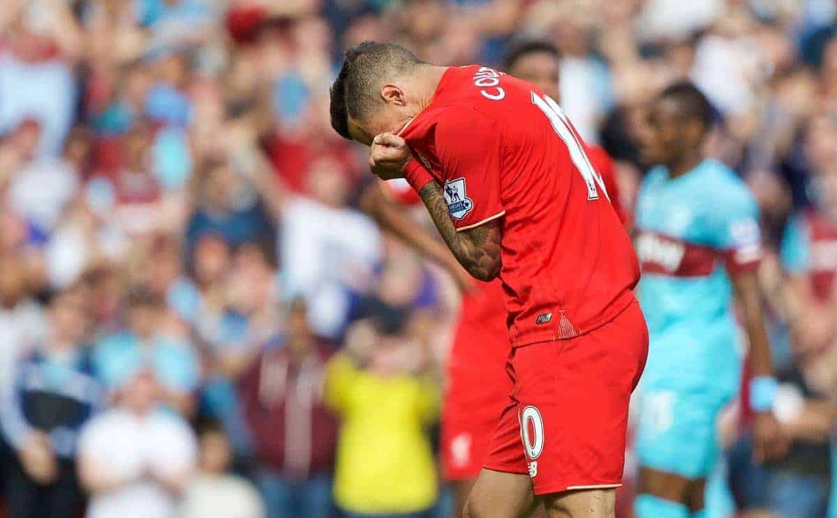 LIVERPOOL, ENGLAND - Saturday, August 29, 2015: Liverpool's Philippe Coutinho Correia looks dejected after being sent off against West Ham United during the Premier League match at Anfield. (Pic by David Rawcliffe/Propaganda)