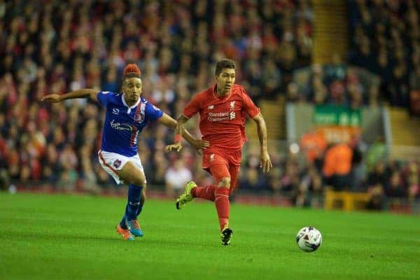 LIVERPOOL, ENGLAND - Wednesday, September 23, 2015: Liverpool's Roberto Firmino in action against Carlisle United's Bastien Hery during the Football League Cup 3rd Round match at Anfield. (Pic by David Rawcliffe/Propaganda)