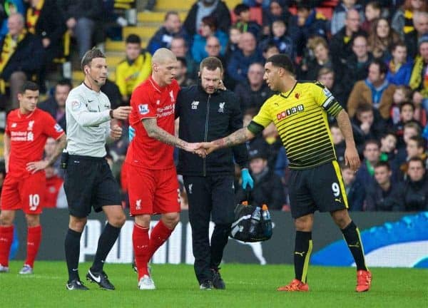 WATFORD, ENGLAND - Sunday, December 20, 2015: Liverpool's Martin Skrtel shakes hands with Watford's captain Troy Deeney as he goes off injured during the Premier League match at Vicarage Road. (Pic by David Rawcliffe/Propaganda)