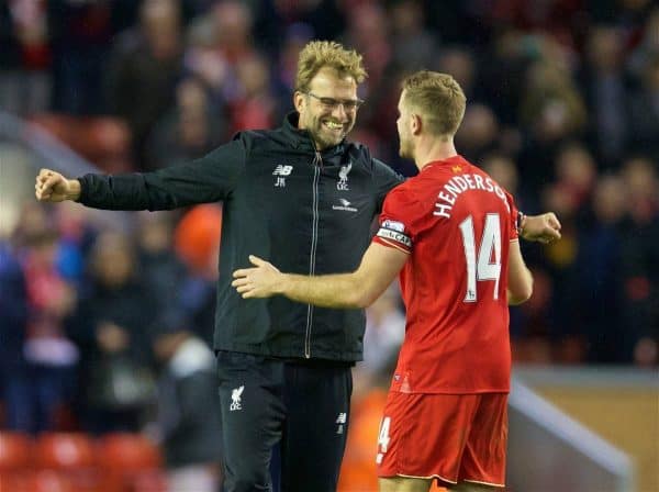 LIVERPOOL, ENGLAND - Boxing Day, Saturday, December 26, 2015: Liverpool's manager Jürgen Klopp celebrates the 1-0 victory over Leicester City with captain Jordan Henderson during the Premier League match at Anfield. (Pic by David Rawcliffe/Propaganda)