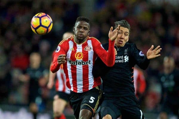 SUNDERLAND, ENGLAND - Monday, January 2, 2017: Liverpool's Roberto Firmino in action against Sunderland's Paps Djilobodji during the FA Premier League match at the Stadium of Light. (Pic by David Rawcliffe/Propaganda)