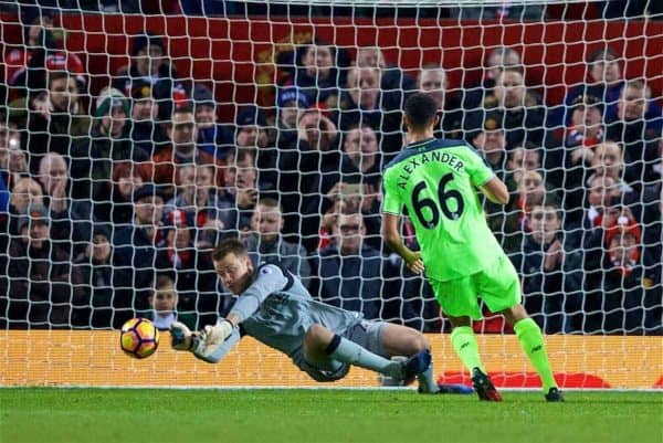 MANCHESTER, ENGLAND - Sunday, January 15, 2017: Liverpool's goalkeeper Simon Mignolet makes a save from a free-kick from Manchester United's Zlatan Ibrahimovic during the FA Premier League match at Old Trafford. (Pic by David Rawcliffe/Propaganda)