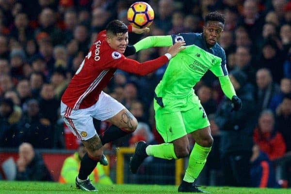 MANCHESTER, ENGLAND - Sunday, January 15, 2017: Liverpool's Divock Origi in action against Manchester United's Marcos Rojo during the FA Premier League match at Old Trafford. (Pic by David Rawcliffe/Propaganda)