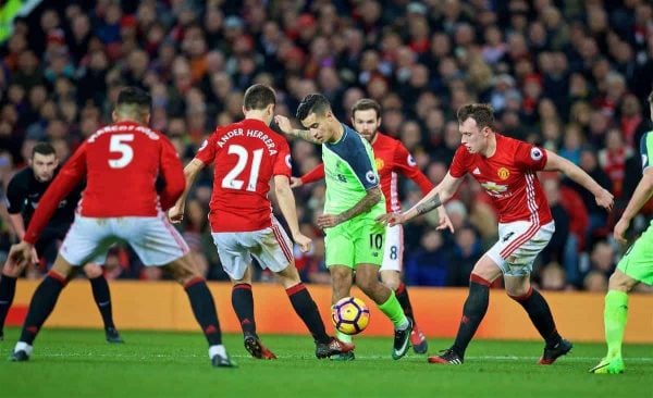 MANCHESTER, ENGLAND - Sunday, January 15, 2017: Liverpool's Philippe Coutinho Correia is surrounded by four Manchester United players during the FA Premier League match at Old Trafford. (Pic by David Rawcliffe/Propaganda)