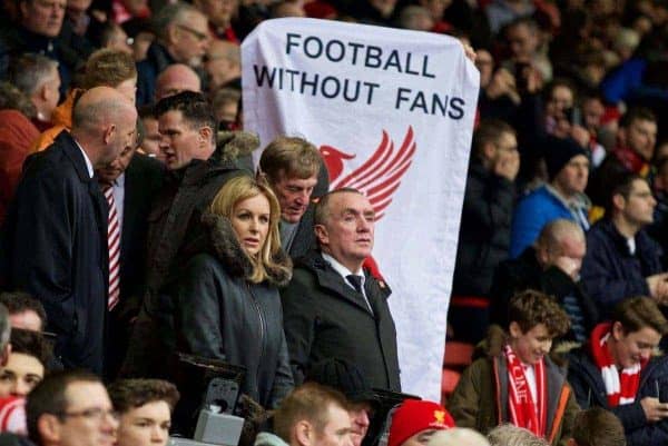 LIVERPOOL, ENGLAND - Saturday, February 6, 2016: Liverpool Managing Director Ian Ayre as fans protest against ticket prices behind him before the Premier League match against Sunderland at Anfield. (Pic by David Rawcliffe/Propaganda)