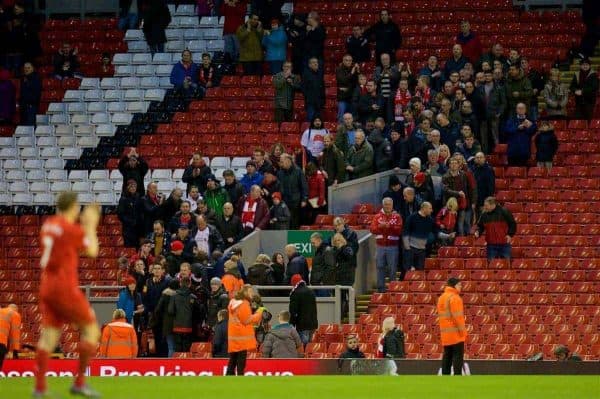 LIVERPOOL, ENGLAND - Saturday, February 6, 2016: Liverpool's James Milner walks off the pitch to an almost empty stadium after supporters staged a 77 minute protest against high ticket prices during the Premier League match against Sunderland at Anfield. (Pic by David Rawcliffe/Propaganda)