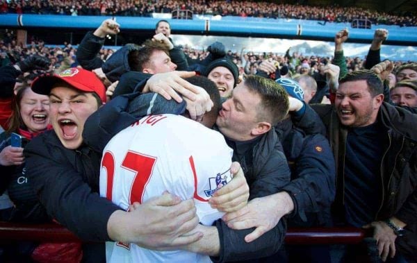 BIRMINGHAM, ENGLAND - Sunday, February 14, 2016: Liverpool's Divock Origi celebrates scoring the fourth goal against with a kiss from a supporter against Aston Villa during the Premier League match at Villa Park. (Pic by David Rawcliffe/Propaganda)