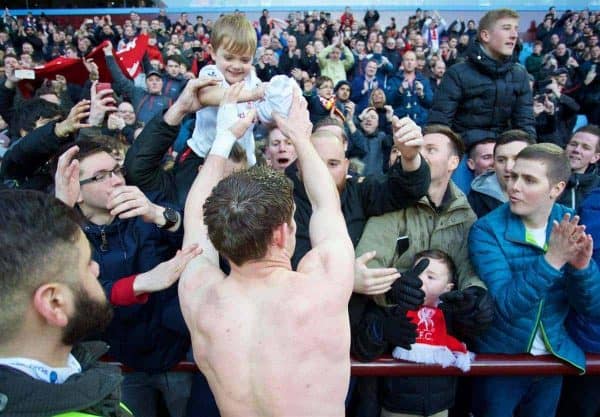 BIRMINGHAM, ENGLAND - Sunday, February 14, 2016: Liverpool's James Milner hands his shirt to a young supporter before the Premier League match against Aston Villa at Villa Park. (Pic by David Rawcliffe/Propaganda)