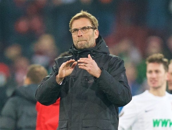 AUGSBURG, GERMANY - Thursday, February 18, 2016: Liverpool's manager Jürgen Klopp applauds the travelling supporters after the goal-less draw against FC Augsburg during the UEFA Europa League Round of 32 1st Leg match at the Augsburg Arena. (Pic by David Rawcliffe/Propaganda)