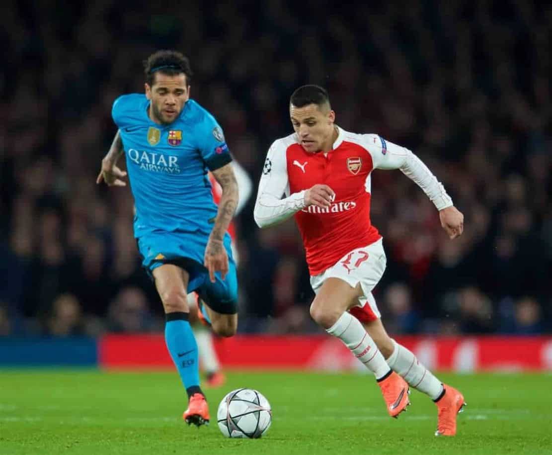 LONDON, ENGLAND - Tuesday, February 23, 2016: Arsenal's Alexis Sanchez in action against FC Barcelona's Dani Alves during the UEFA Champions League Round of 16 1st Leg match at the Emirates Stadium. (Pic by Kirsten Holst/Propaganda)