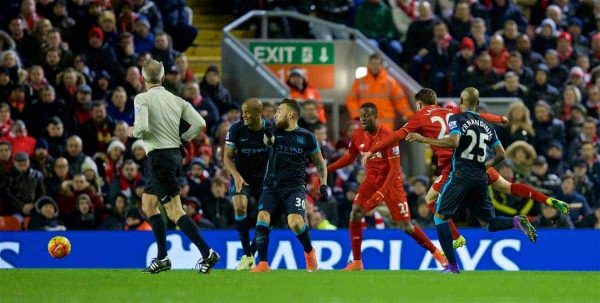 LIVERPOOL, ENGLAND - Wednesday, March 2, 2016: Liverpool's Adam Lallana scores the first goal against Manchester City during the Premier League match at Anfield. (Pic by David Rawcliffe/Propaganda)