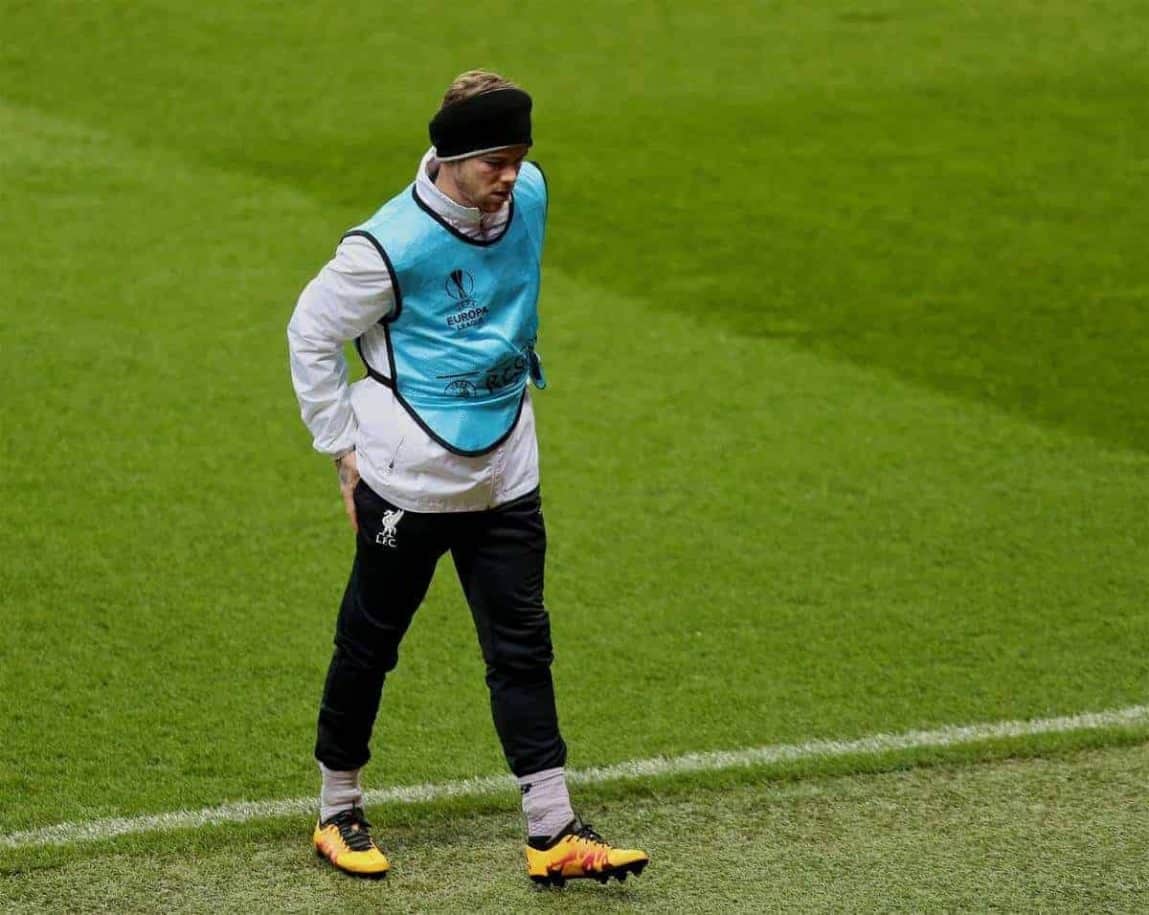 MANCHESTER, ENGLAND - Wednesday, March 16, 2016: Liverpool's Alberto Moreno limps off injured during a training session at Old Trafford ahead of the UEFA Europa League Round of 16 2nd Leg match against Manchester United. (Pic by David Rawcliffe/Propaganda)