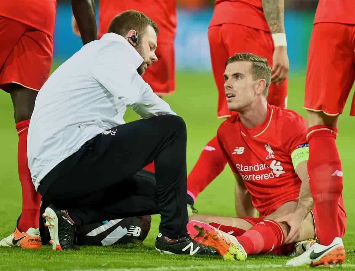 DORTMUND, GERMANY - Thursday, April 7, 2016: Liverpool's captain Jordan Henderson is treated by physiotherapist Chris Morgan for an injury during the UEFA Europa League Quarter-Final 1st Leg match against Borussia Dortmund at Westfalenstadion. (Pic by David Rawcliffe/Propaganda)