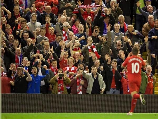 LIVERPOOL, ENGLAND - Wednesday, April 20, 2016: Liverpool's Philippe Coutinho Correia celebrates scoring the fourth goal against Everton with the supporters during the Premier League match at Anfield, the 226th Merseyside Derby. (Pic by David Rawcliffe/Propaganda)