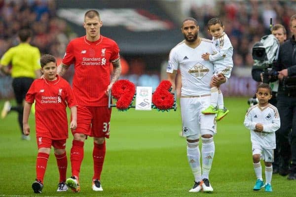 SWANSEA, WALES - Sunday, May 1, 2016: Liverpool's Martin Skrtel and Swansea City's captain Ashley Williams present a floral tribute to the 96 victims of the Hillsborough disaster before the Premier League match at the Liberty Stadium. (Pic by David Rawcliffe/Propaganda)